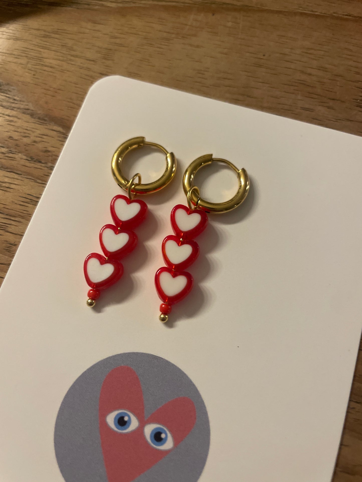 ‘TRIPLE RED HEART’ earrings